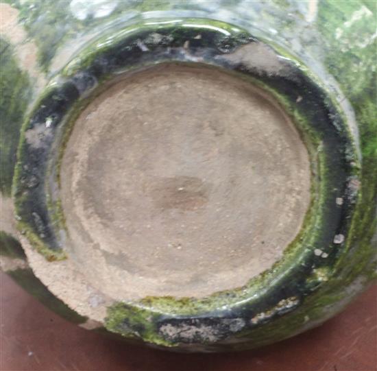 Two Chinese green-glazed flasks, possibly Liao dynasty, 26.5cm and 29.5cm